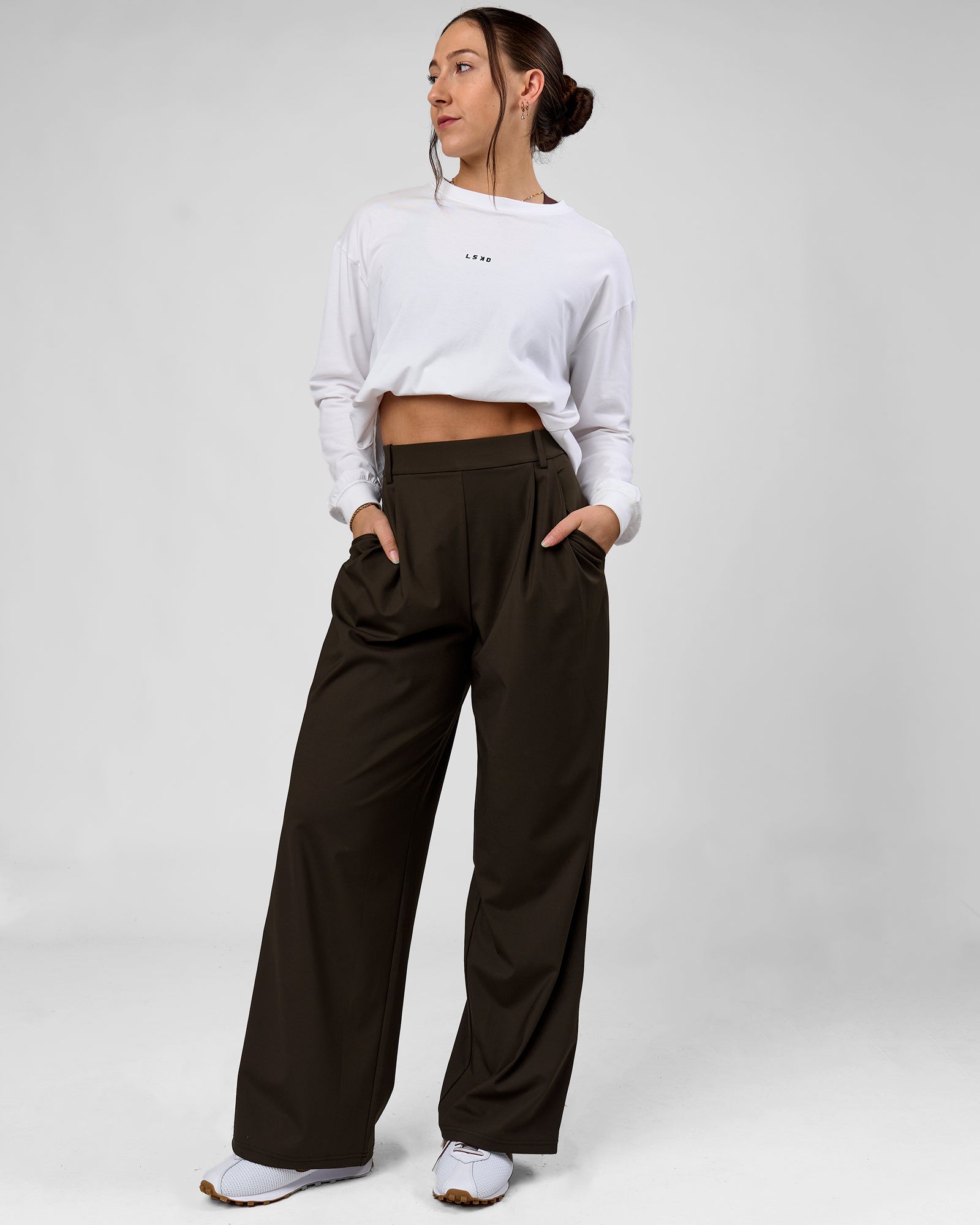 Woman wearing StretchShift Wide Leg Pant - Ground Coffee | Model:Summer | Size:S