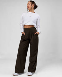Woman wearing StretchShift Wide Leg Pant - Ground Coffee | Model:Summer | Size:S | Thumbnail Index: 0