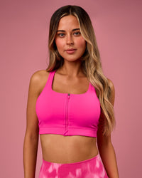 Woman wearing Empowered Sports Bra - Ultra Pink | Model:Tianah | Size:S | Thumbnail Index: 0