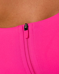 Woman wearing Empowered Sports Bra - Ultra Pink | Model:Tianah | Size:S | Thumbnail Index: 6