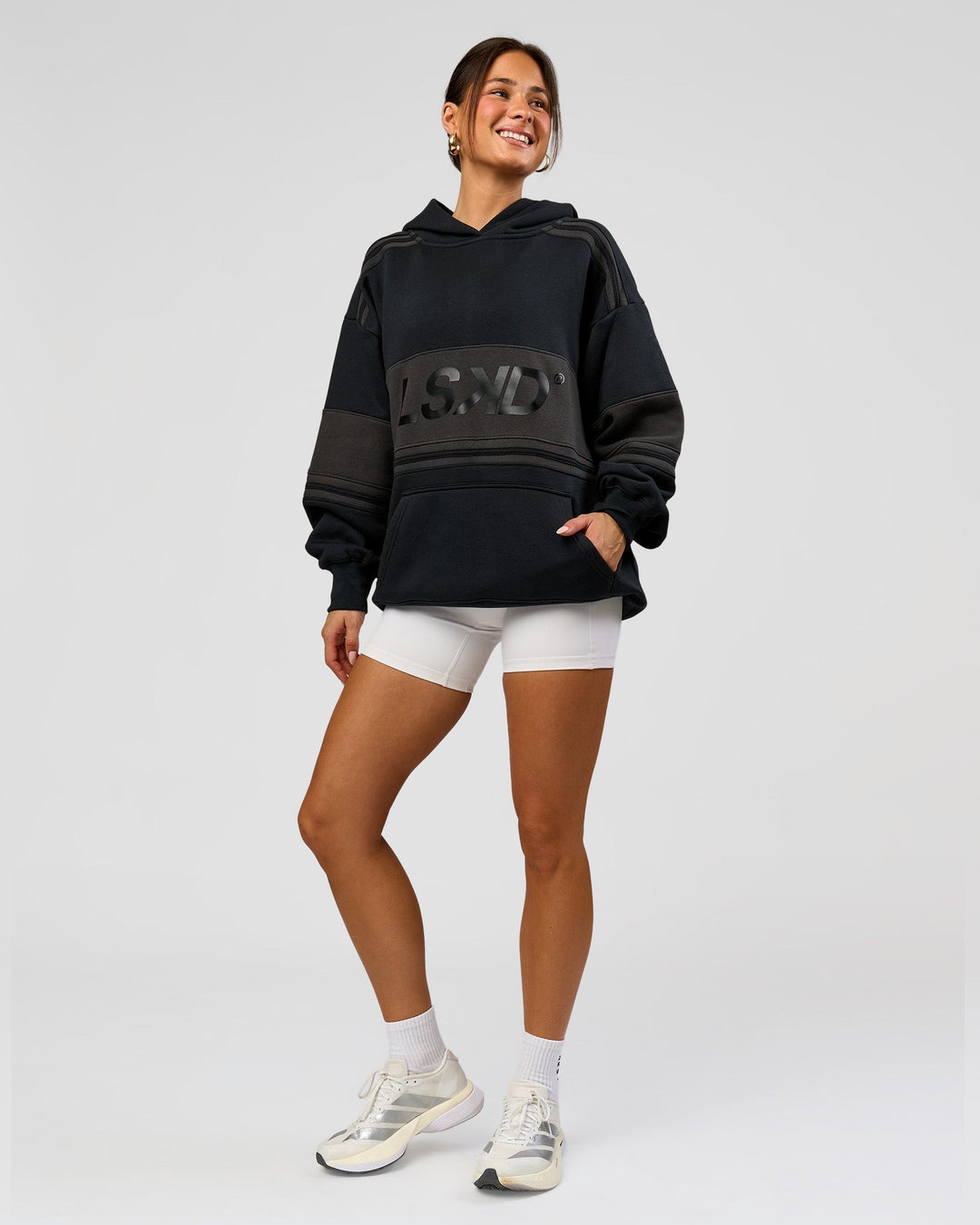 Woman wearing A-Team Oversized Hoodie - Caviar-Onyx | Model:Bianca | Size:XS - view 12