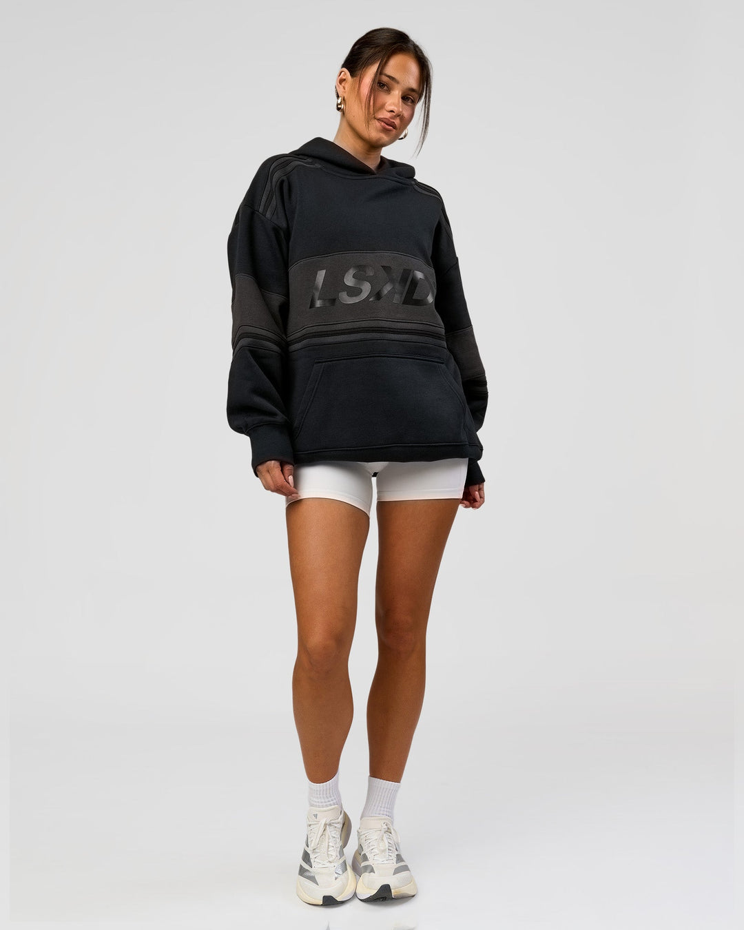 Woman wearing A-Team Oversized Hoodie - Caviar-Onyx | Model:Bianca | Size:XS - view 14