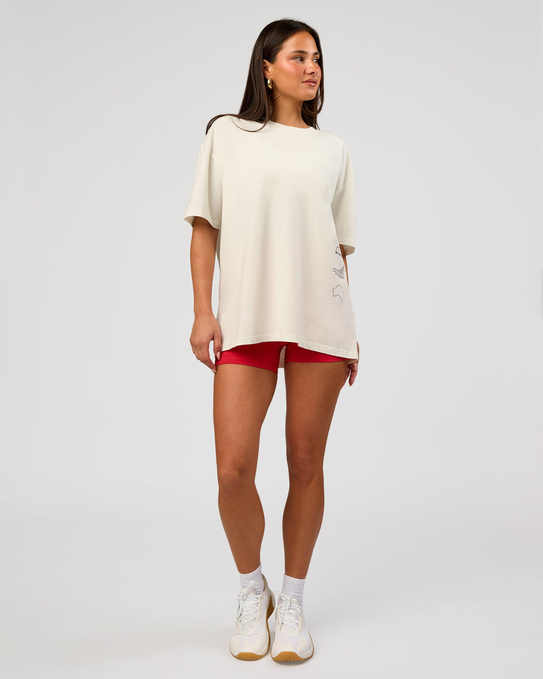 Woman wearing Greatest of All Time Heavyweight FLXCotton Oversized Tee - Off White Washed-Scarlet | Model:Bianca | Size:XS - view 12