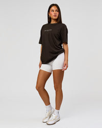 Woman wearing VS1 Enjoy The Journey FLXCotton Oversize Tee - Ground Coffee | Model:Bianca | Size:XS | Thumbnail Index: 3
