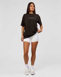 Woman wearing VS1 Enjoy The Journey FLXCotton Oversize Tee - Ground Coffee | Model:Bianca | Size:XS | Thumbnail Index: 6