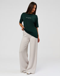 Woman wearing VS1 Enjoy The Journey FLXCotton Oversize Tee - Midnight Green | Model:Bianca | Size:XS | Thumbnail Index: 12