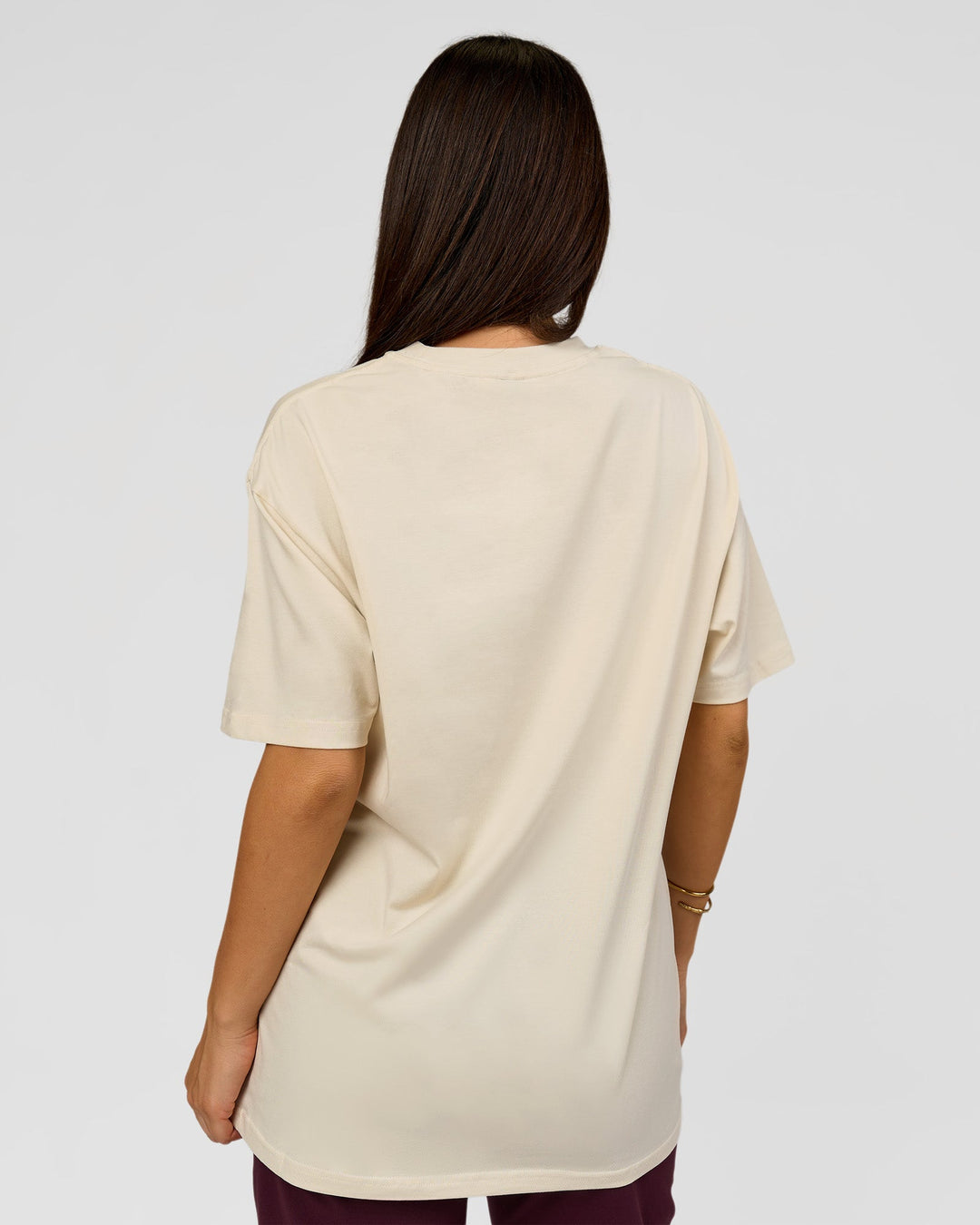 Woman wearing VS1 Enjoy The Journey FLXCotton Oversize Tee - Vanilla Bean | Model:Bianca | Size:XS - view 13