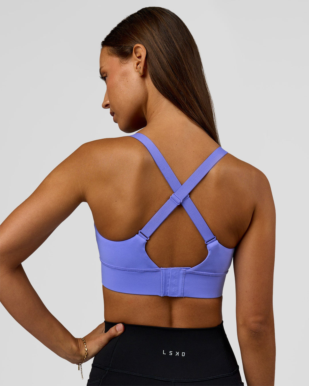 Woman wearing Accelerate Sports Bra - Bluebell | Model:Brylee | Size:XS - view 3