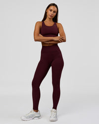 Woman wearing Accelerate Sports Bra - Cherry Lacquer | Model:Brylee | Size:XS | Thumbnail Index: 3