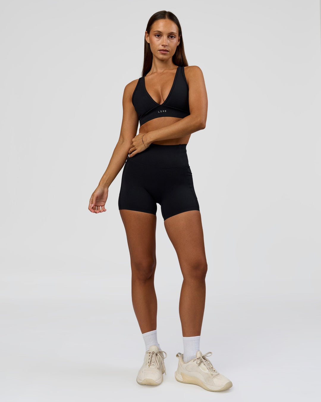 Woman wearing Fusion Bonded High-Rise 4" Short Pockets - Black | Model:Brylee | Size:XS - view 4