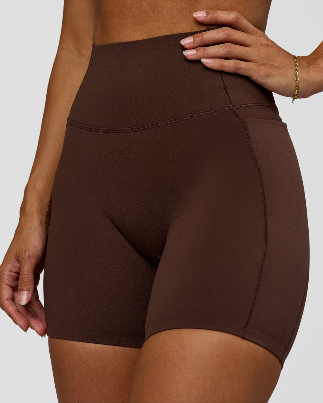 Woman wearing Fusion Bonded High-Rise 6" Short Pockets - Hot Chocolate | Model:Brylee | Size:XS - view 1