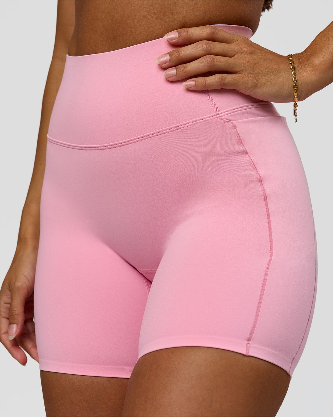 Woman wearing Fusion Bonded High-Rise 6" Short Pockets - Pink Rose | Model:Brylee | Size:XS - view 2