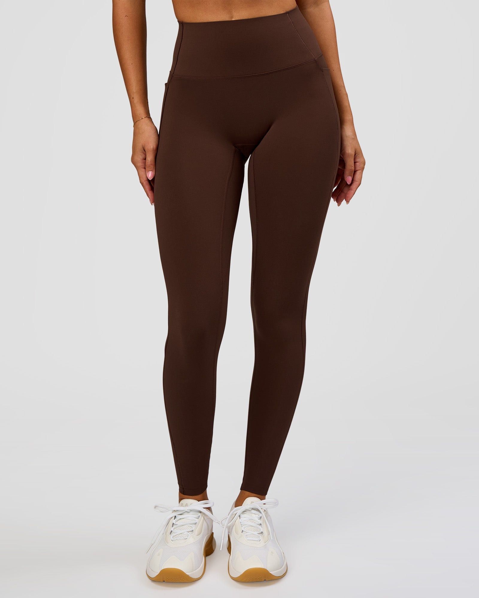 Woman wearing Fusion Bonded High-Rise Full Length Legging Pockets - Hot Chocolate | Model:Brylee | Size:XS