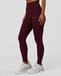 Woman wearing Fusion Ultra High-Rise Full Length Legging Pockets - Cherry Lacquer | Model:Brylee | Size:XS | Thumbnail Index: 0