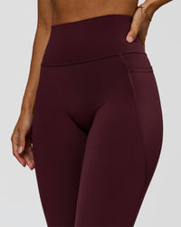 Woman wearing Fusion Ultra High-Rise Full Length Legging Pockets - Cherry Lacquer | Model:Brylee | Size:XS | Thumbnail Index: 1