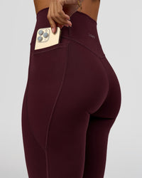Woman wearing Fusion Ultra High-Rise Full Length Legging Pockets - Cherry Lacquer | Model:Brylee | Size:XS | Thumbnail Index: 2