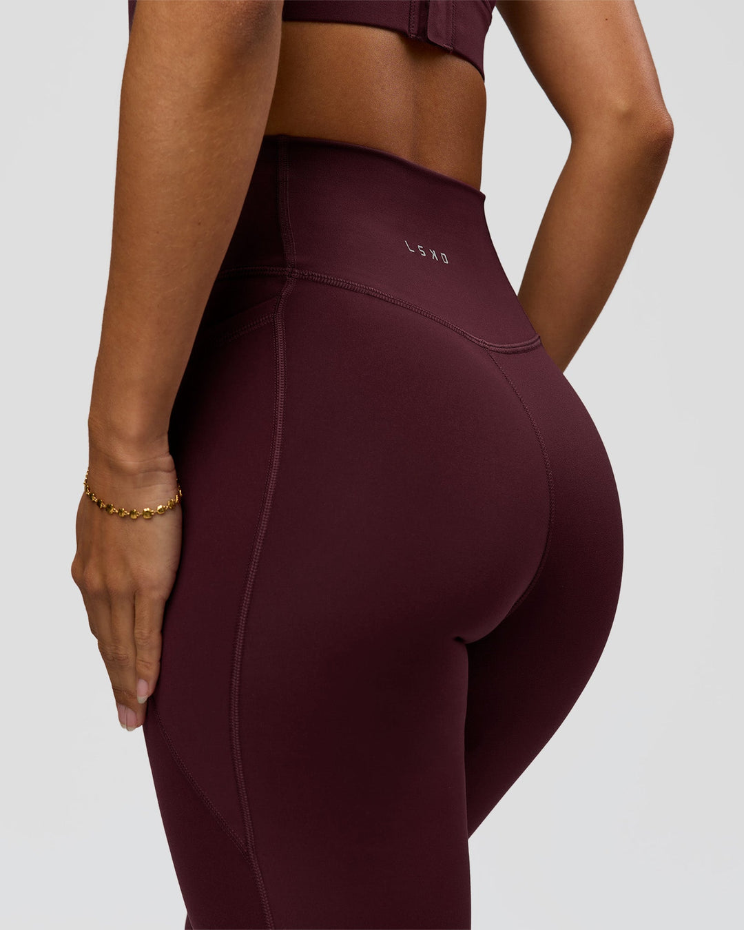 Woman wearing Fusion Ultra High-Rise Full Length Legging Pockets - Cherry Lacquer | Model:Brylee | Size:XS - view 5