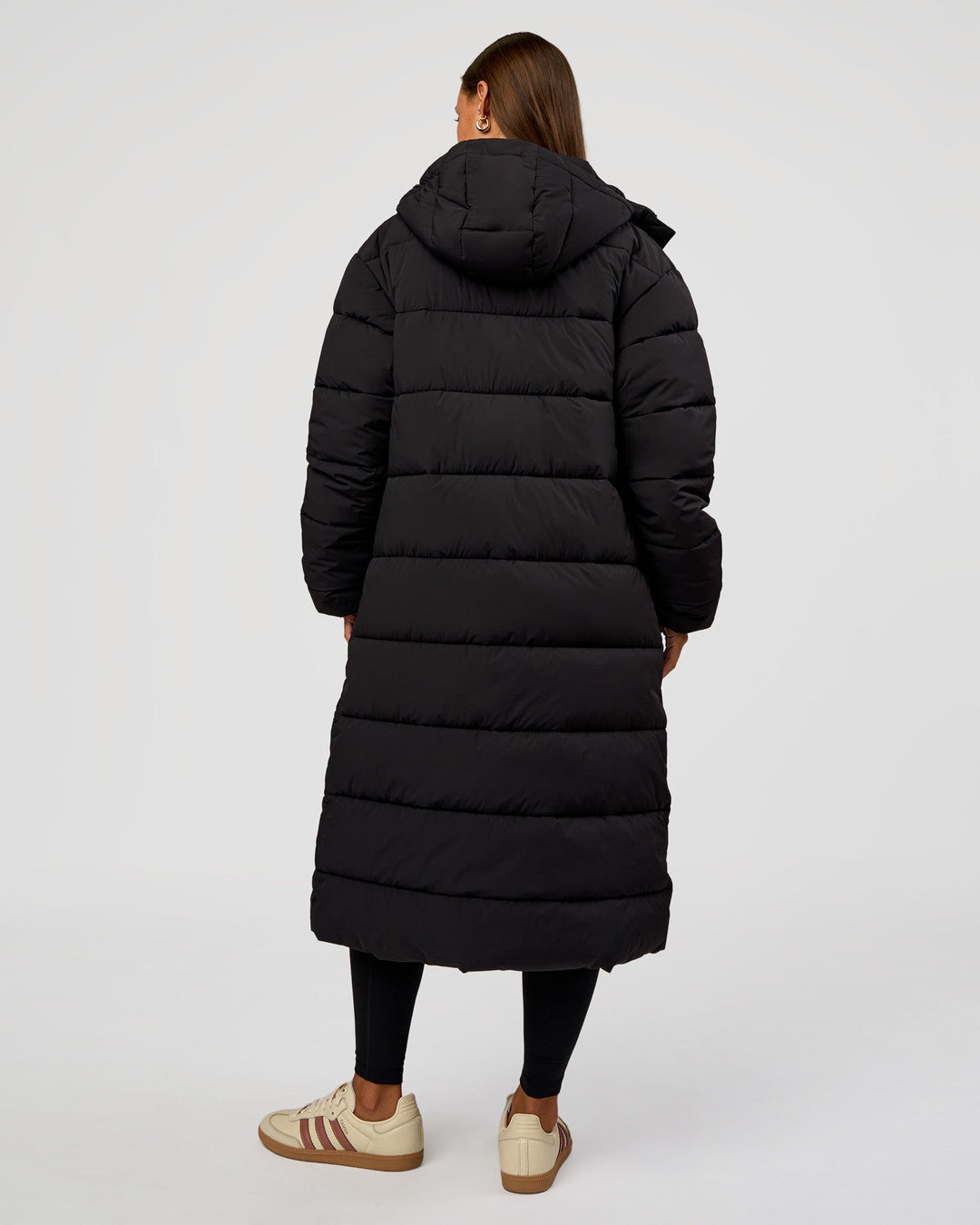 Woman wearing Go-To Puffer Long Jacket - Black | Model:Brylee | Size:XS - view 12