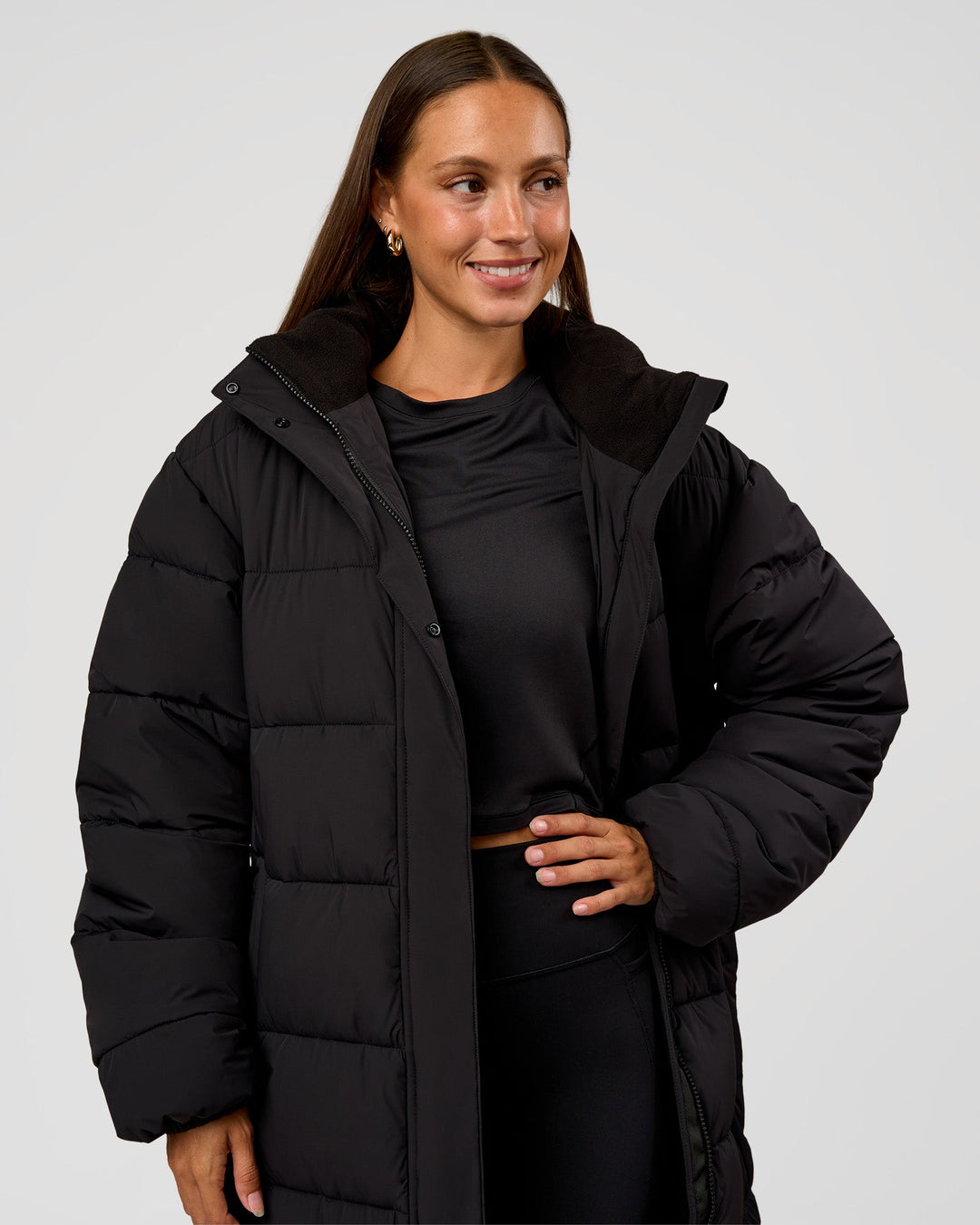 Woman wearing Go-To Puffer Long Jacket - Black | Model:Brylee | Size:XS - view 8