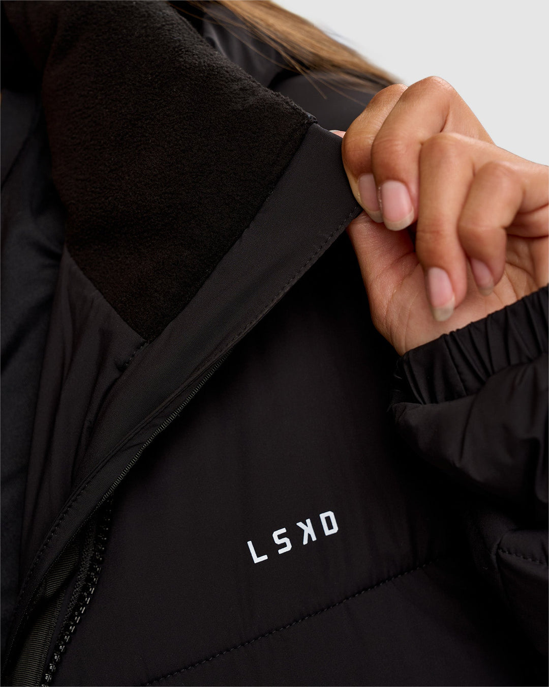Woman wearing Go-To Puffer Long Jacket - Black | Model:Brylee | Size:XS - view 4