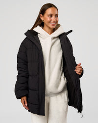 Woman wearing Go-To Puffer Mid Jacket - Black | Model:Brylee | Size:XS | Thumbnail Index: 4