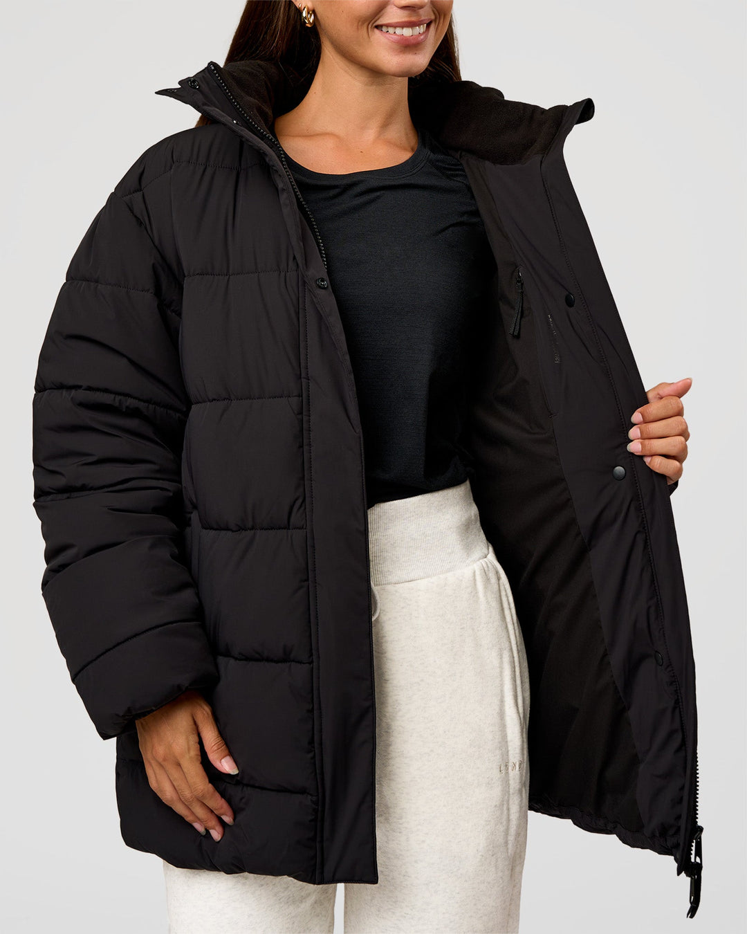Woman wearing Go-To Puffer Mid Jacket - Black | Model:Brylee | Size:XS - view 7