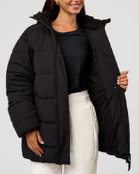 Woman wearing Go-To Puffer Mid Jacket - Black | Model:Brylee | Size:XS | Thumbnail Index: 6