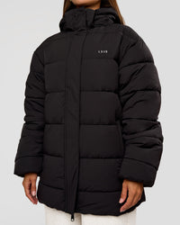 Woman wearing Go-To Puffer Mid Jacket - Black | Model:Brylee | Size:XS | Thumbnail Index: 8