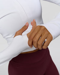 Woman wearing Sculpt Full Zip Long Sleeve Top - White | Model:Brylee | Size:XS | Thumbnail Index: 13