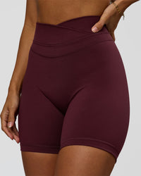 Woman wearing Solstice High-Rise 6" Short - Cherry Lacquer | Model:Brylee | Size:XS | Thumbnail Index: 0