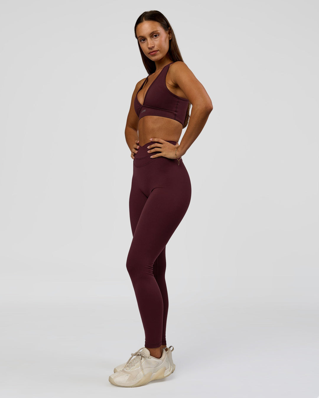 Woman wearing Stamina Sports Bra - Cherry Lacquer | Model:Brylee | Size:XS - view 7