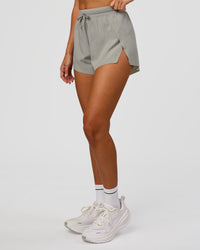 Woman wearing Accelerate 3" High-Rise Running Short - Alloy | Model:Charli | Size:XS | Thumbnail Index: 4