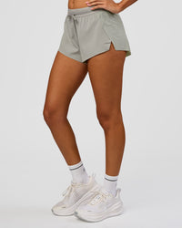 Woman wearing Accelerate 3" Mid-Rise Running Short - Alloy | Model:Charli | Size:XS | Thumbnail Index: 5