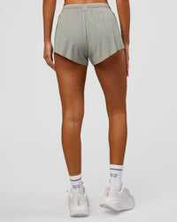 Woman wearing Accelerate 3" Mid-Rise Running Short - Alloy | Model:Charli | Size:XS | Thumbnail Index: 7