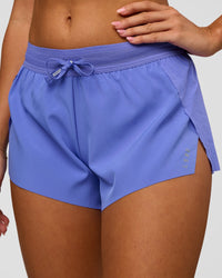 Woman wearing Accelerate 3" Mid-Rise Running Short - Bluebell | Model:Charli | Size:XS | Thumbnail Index: 0