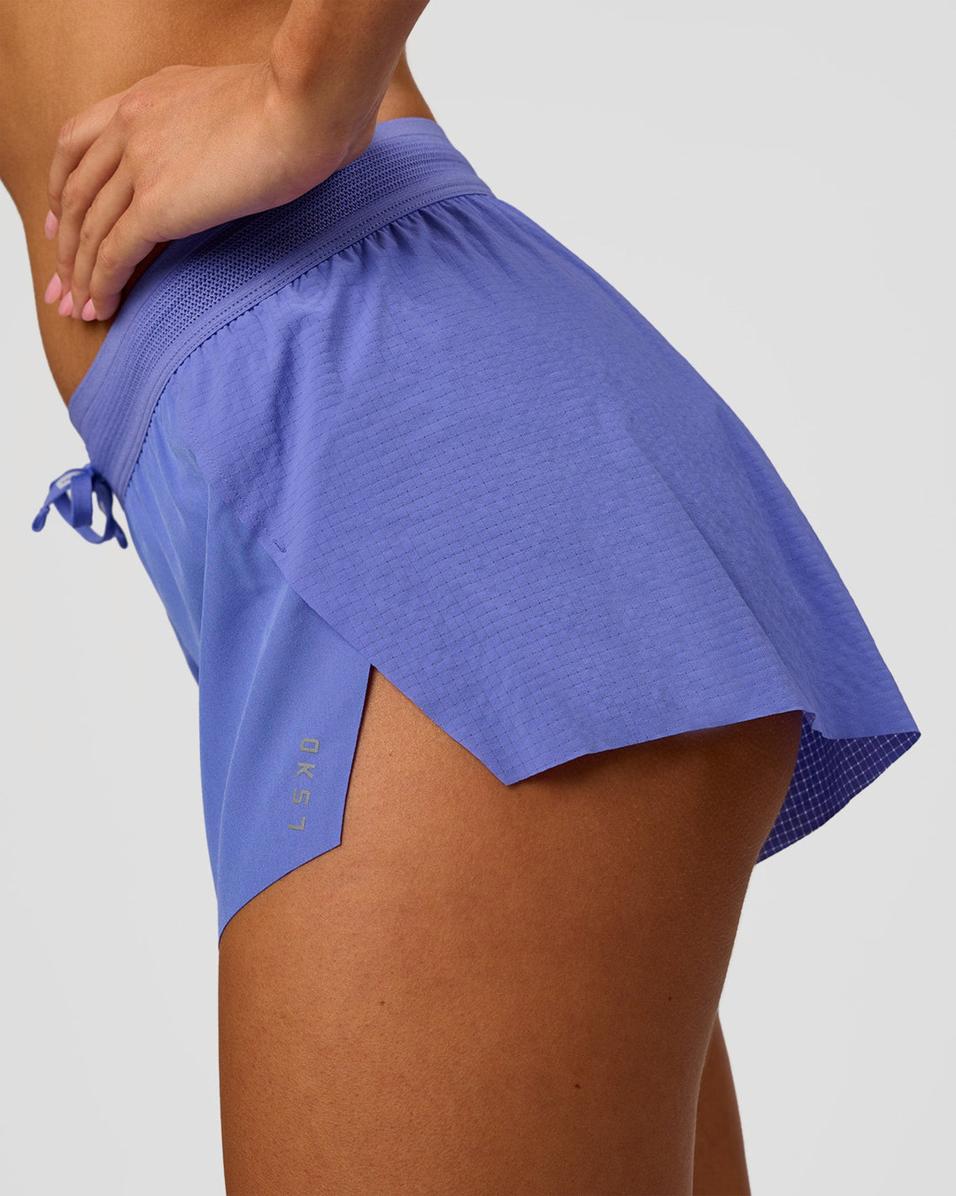 Woman wearing Accelerate 3" Mid-Rise Running Short - Bluebell | Model:Charli | Size:XS - view 3