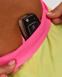 Woman wearing Accelerate 3" Mid-Rise Running Short - Lime Glo-Sugar Plum | Model:Charli | Size:XS | Thumbnail Index: 7
