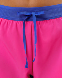Woman wearing Accelerate 3" Mid-Rise Running Short - Power Cobalt- Ultra Pink | Model:Charli | Size:XS | Thumbnail Index: 4