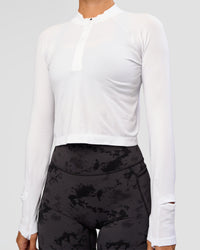 Woman wearing AeroFLX+ Long Sleeve Skimmer Half Zip - White/White | Model:Charli | Size:XS | Thumbnail Index: 4