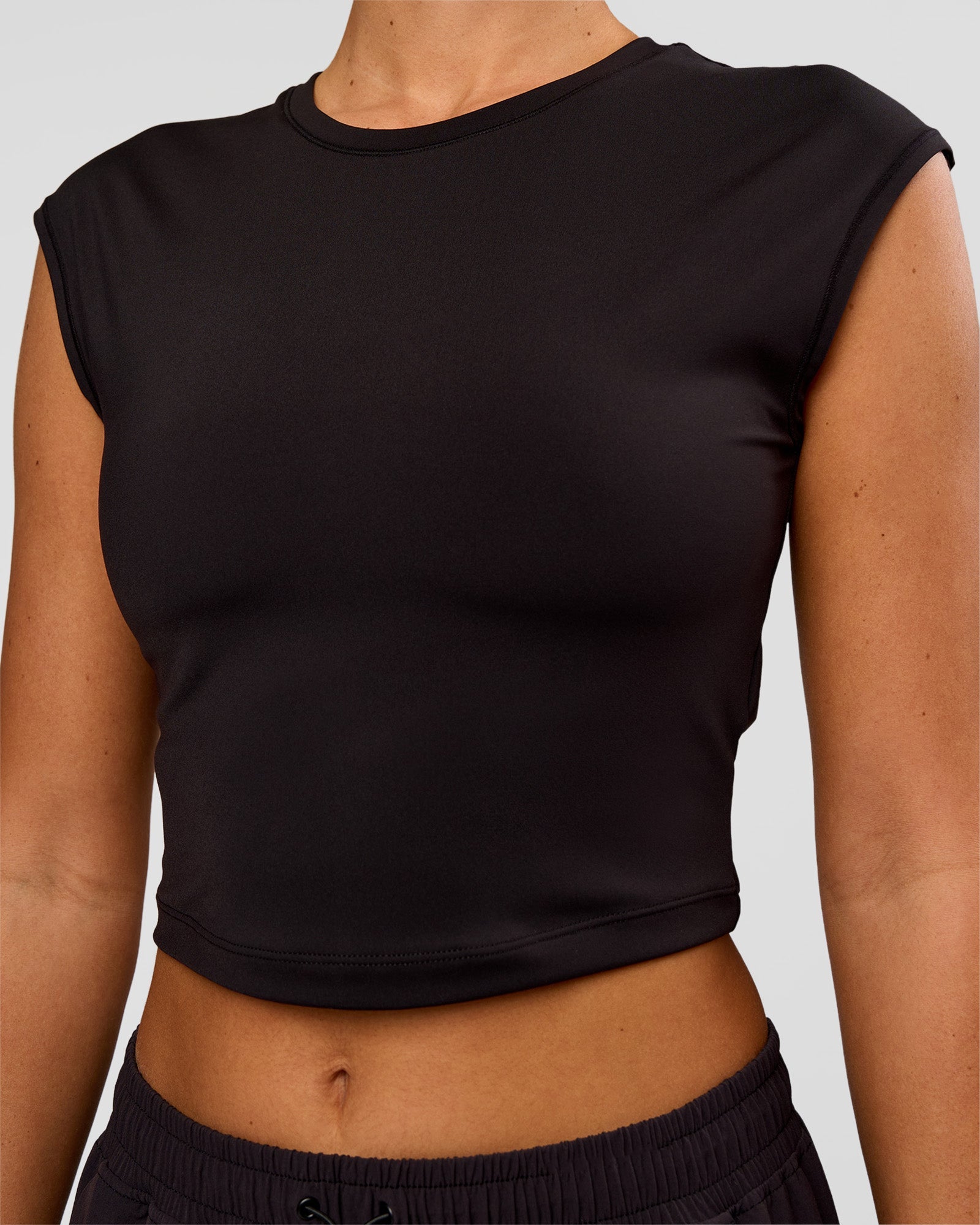 Woman wearing All Day Cropped Sleeve Top - Black | Model:Charli | Size:XS