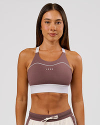 Woman wearing Elevated Accelerate Sports Bra - Cocoa Power-White | Model:Charli | Size:XS | Thumbnail Index: 1