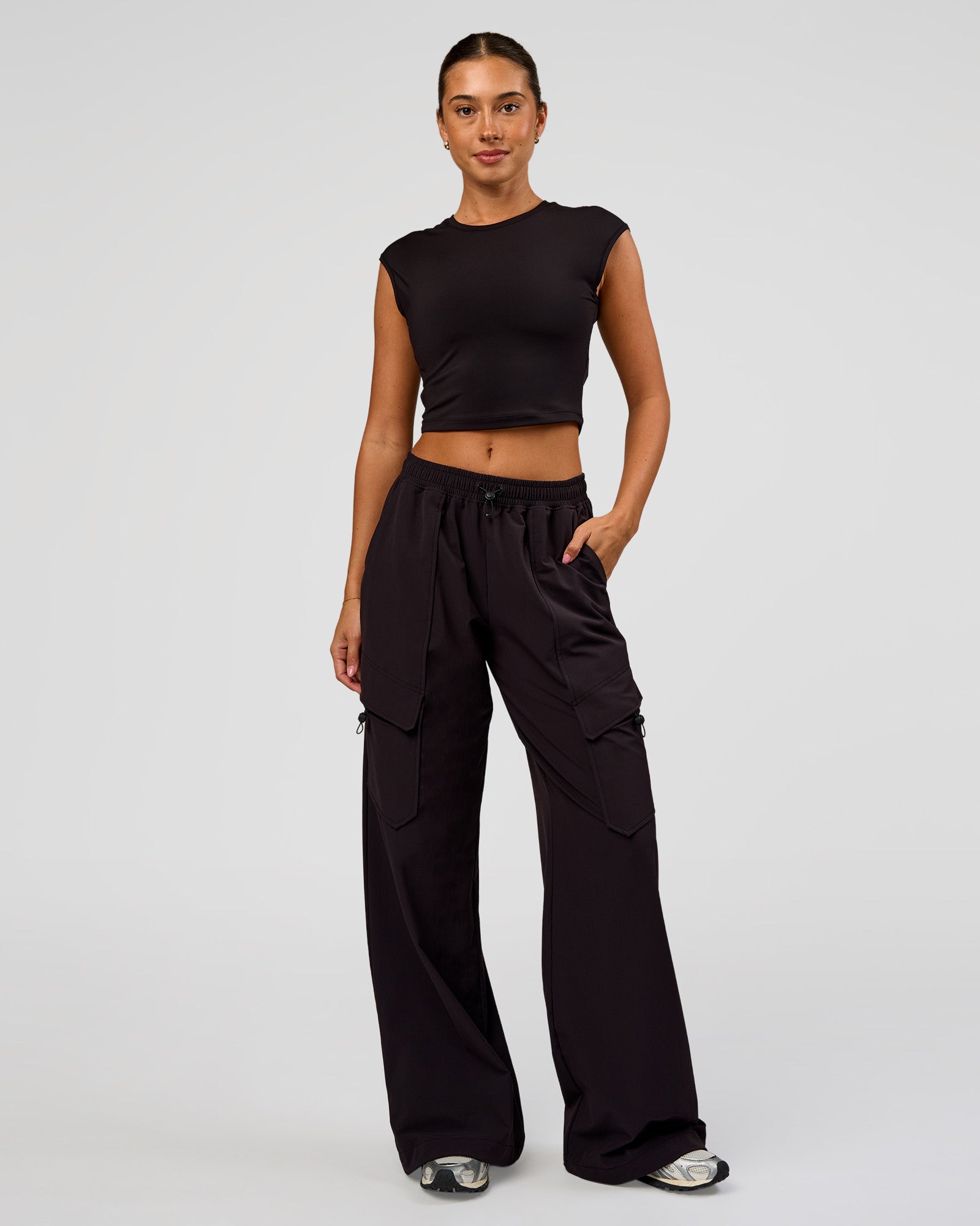 Woman wearing Endeavour Cargo Pant - Black | Model:Charli | Size:XS