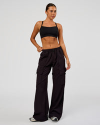 Woman wearing Endeavour Cargo Pant - Black | Model:Charli | Size:XS | Thumbnail Index: 5