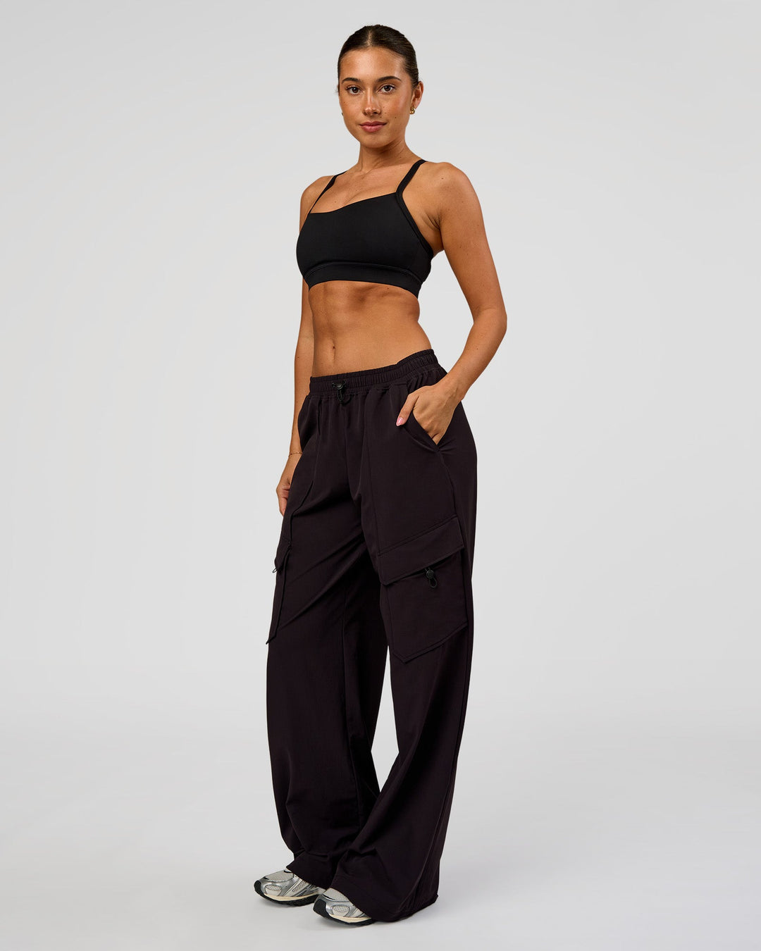 Woman wearing Endeavour Cargo Pant - Black | Model:Charli | Size:XS - view 7
