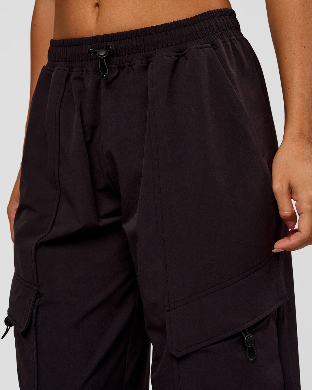 Woman wearing Endeavour Cargo Pant - Black | Model:Charli | Size:XS - view 3