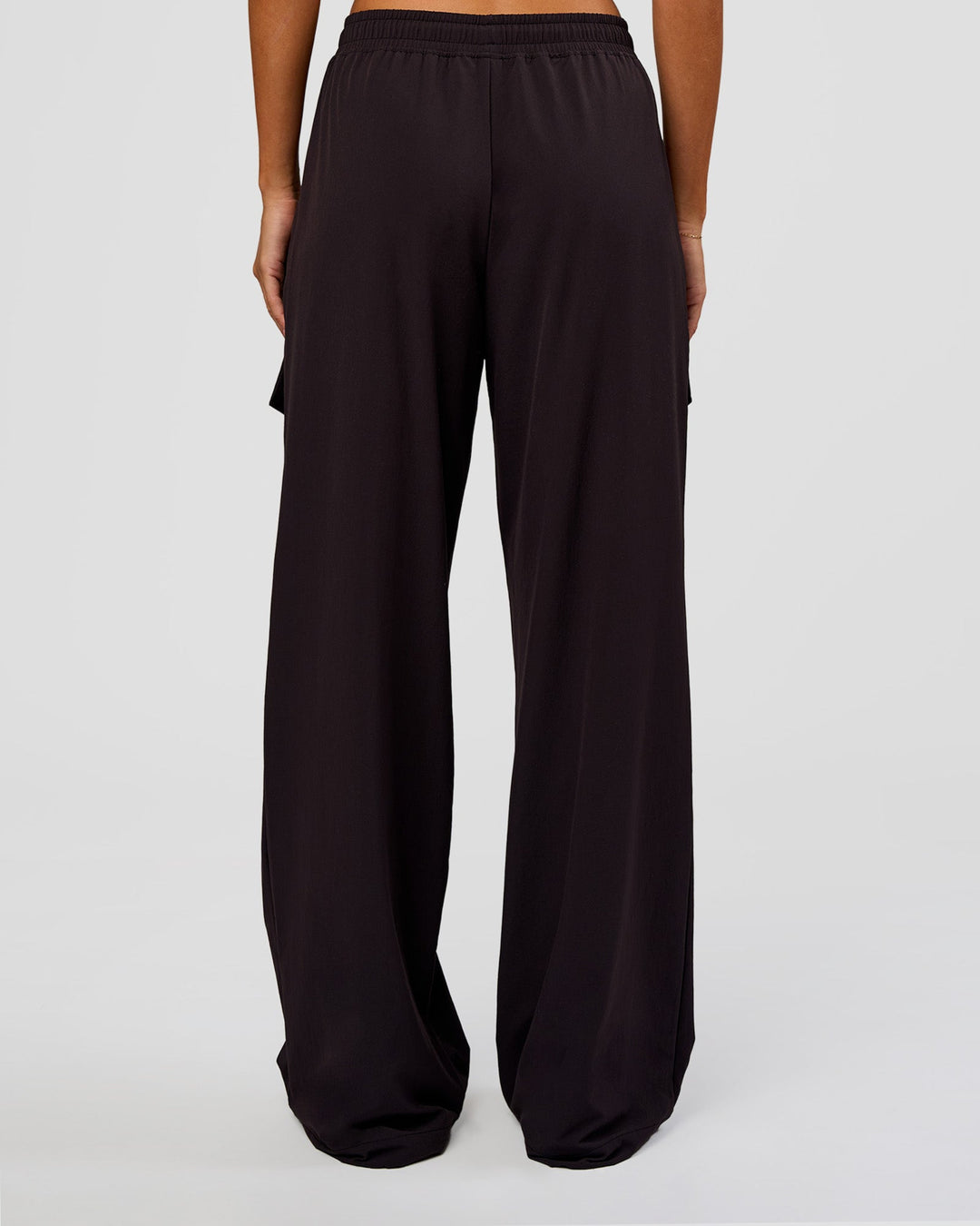 Woman wearing Endeavour Cargo Pant - Black | Model:Charli | Size:XS - view 4