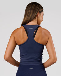 Woman wearing Flow Performance Tank 2.0 - Future Navy | Model:Charli | Size:XS | Thumbnail Index: 3