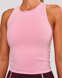 Woman wearing Flow Performance Tank 2.0 - Pink Rose | Model:Charli | Size:XS | Thumbnail Index: 1