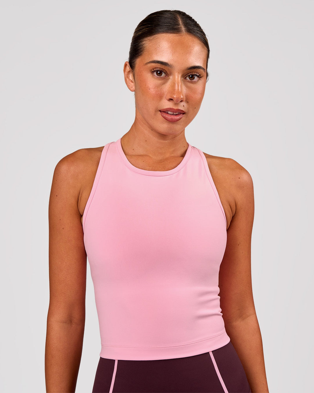 Woman wearing Flow Performance Tank 2.0 - Pink Rose | Model:Charli | Size:XS - view 1