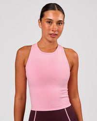 Woman wearing Flow Performance Tank 2.0 - Pink Rose | Model:Charli | Size:XS | Thumbnail Index: 0